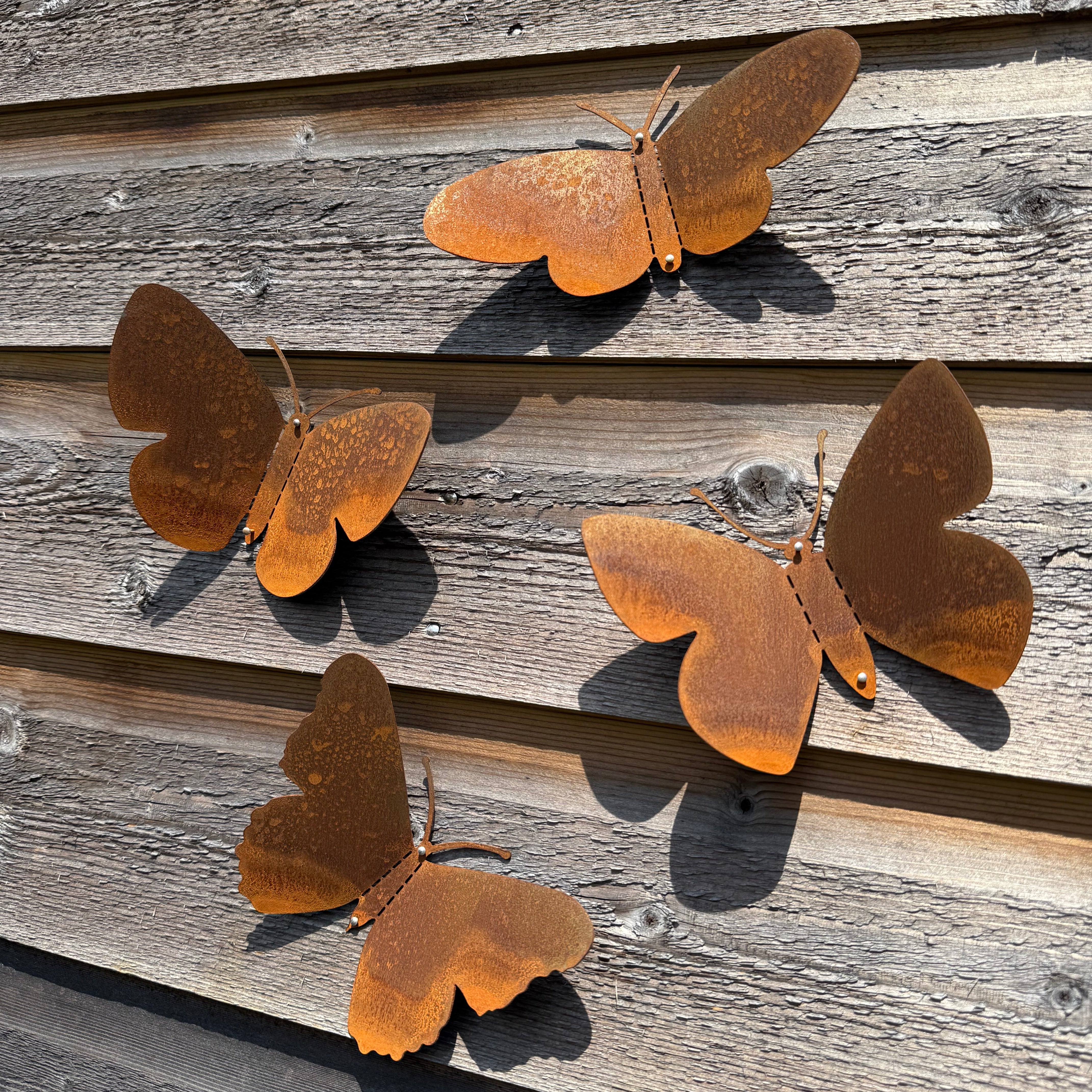 Tuinvorm BUTTERFLIES – set van 4 cortenstalen vlinders voor wandmontage
